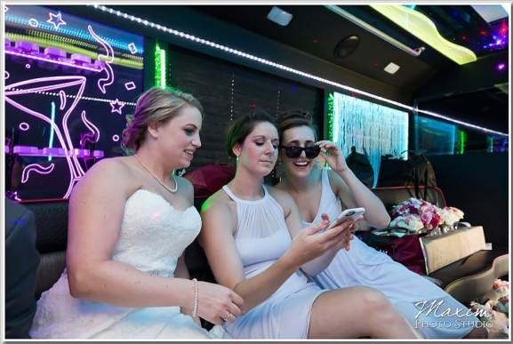 Happy customers enjoying luxury limousine service from cargoworld.pro during a memorable event.